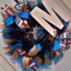 Festive Blue and Gold Holiday Wreath